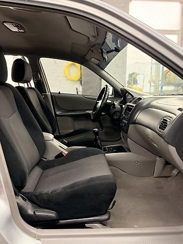 Mazda: Mazda 323: 2003 г., 1.6 л, Механика, Бензин, Универсал — 10