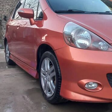 зарядник аккумулятора автомобиля: Honda Jazz: 2008 г., 1.4 л, Вариатор, Бензин