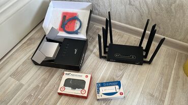 охладитель телефона: 4 за 4000 сом Новые (один 8 антенный без коробки) 2 роутера 1
