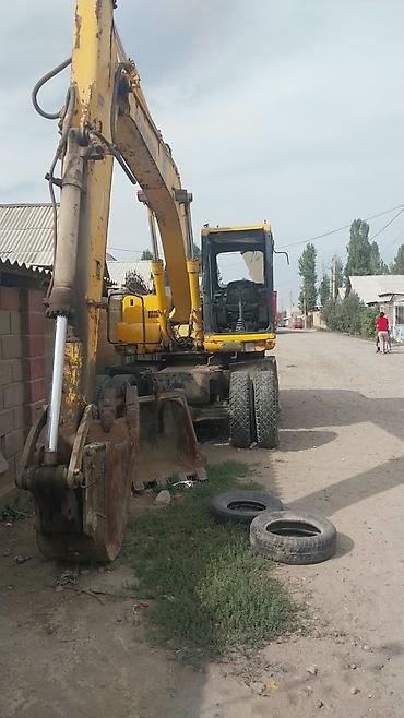 komatsu: Экскаватор, Komatsu, 2004 г., Колесный — 6