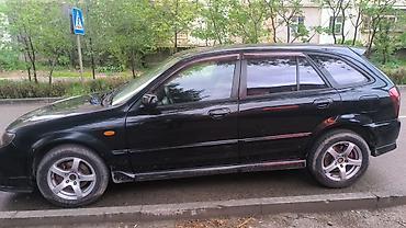 agm: Mazda 323: 2003 г., 2 л, Механика, Газ, Универсал — 3
