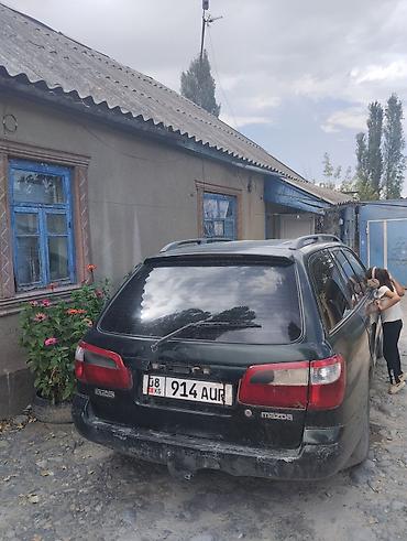 стёк: Mazda 626: 2000 г., 2 л, Механика, Бензин, Универсал — 6
