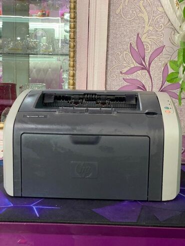лазерные принтеры: Монохромный лазерный принтер HP LaserJet 1010, выполненный в