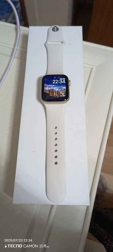 tab a9: Умные часы Apple Watch SE (2-го поколения) с корпусом цвета "Звездный