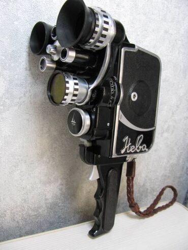 Видеокамеры: Продаю советскую, рабочую, красивую, винтажную кинокамеру "Нева" 1963 — 5