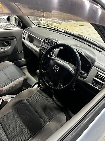 220 mers: Mazda Demio: 2002 г., Автомат — 4