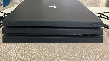 PS4 (Sony Playstation 4): Sony PlayStation 4 Pro oyun konsolu seti - Model: PS4 Pro (CUH — 2