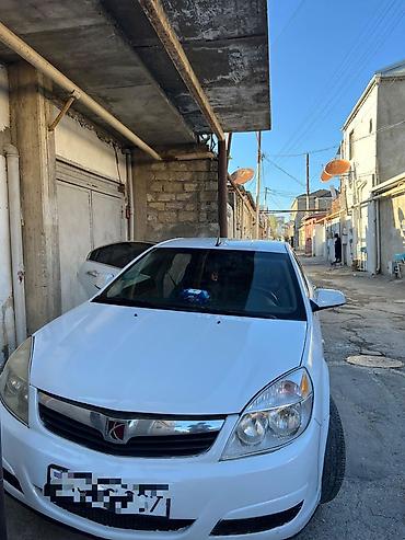2005 kia sephia: Saturn : 2.4 l | 2009 il 4657 km Sedan — 3