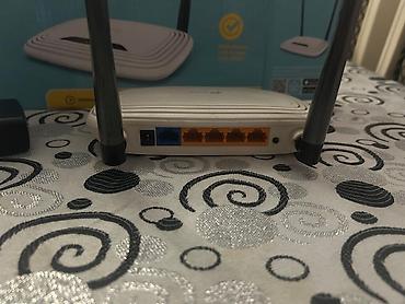 Modemlər və şəbəkə avadanlıqları: TP-Link TL-WR841N – 300Mbps Wireless N Router. - Sürət: 300 Mbps — 4