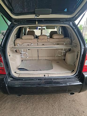 фольксваген поло л с: Hyundai Tucson: 2.7 л | 2006 г. Кроссовер — 8