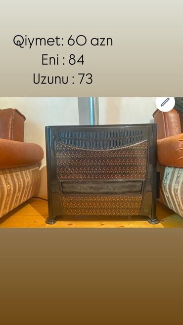 mi 12 t: Qara rəngdə, naxışlı dizaynı olan soba. Ev və ya ofis üçün əlverişli