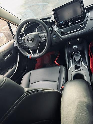 byd e1: Toyota Corolla: 2021 г., 1.8 л, Вариатор, Гибрид, Седан — 9
