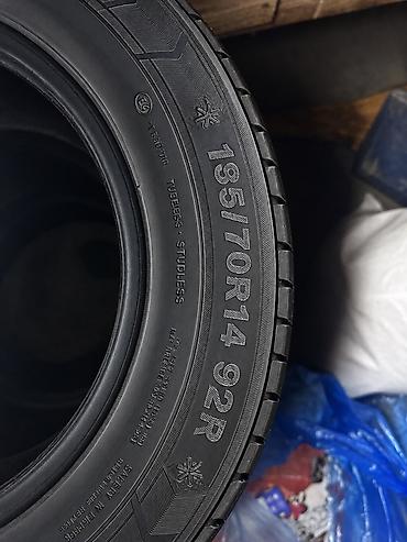 титан мазда 15: Комплект зимних шин без шипов (studless), размер 195/70 R14 92R — 1