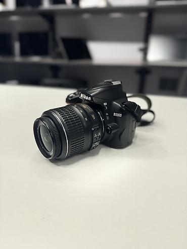 nikon d70s: Зеркальная камера Nikon D3000 с объективом AF‑S DX NIKKOR 18–55mm — 1