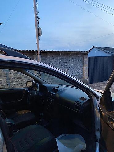 Opel: Opel Astra: 2 l | 1998 il Universal — 12