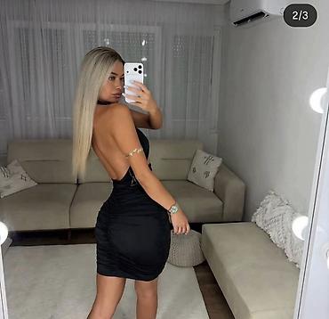 svecani top: Haljina crna boja sa izrezima – elegantan, party model. - Kroj: uska — 2