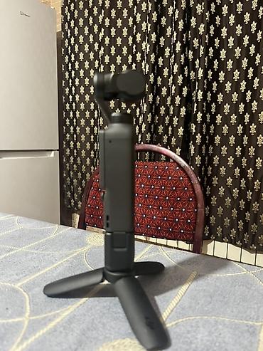 osmo mobile 7: DJI Osmo Pocket (seriyası) kompakt 4-oxlu stabilizatorlu cib kamerası — 1