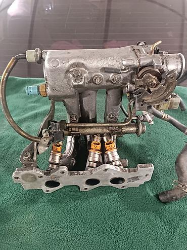 Коллекторы: Коллектор Daihatsu 1997 г., Б/у, Оригинал — 2