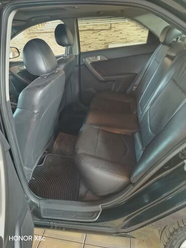 Kia: Kia Cerato: 2 l | 2009 il Sedan — 11