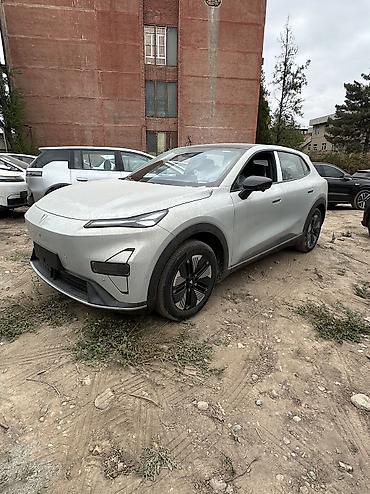 прикуриватель аккумулятора: Электромобиль Seres S05 (надпись на корме) — компактный кроссовер с — 6