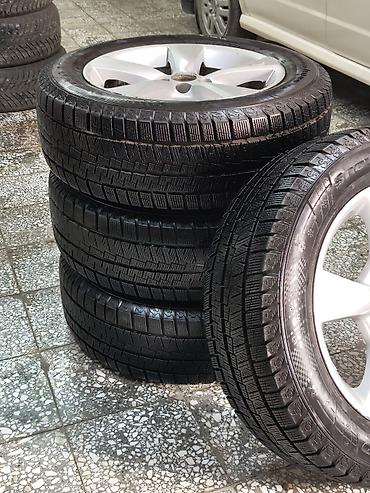Колеса в сборе 235 / 60 / R 18, Зима, Б/у, Комплект, Литые, отверстий - 5