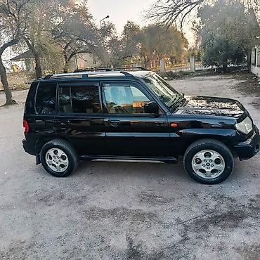 mitsubishi pajero 2000: Mitsubishi Pajero: 1.8 l | 1998 il Ofrouder/SUV — 3