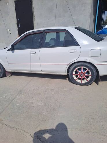 авто унаага алмашам: Mazda Familia: 2000 г., 2 л, Механика, Дизель, Седан