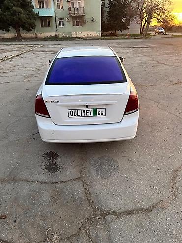 daewoo gentra oluxanasi: DAYVO GENTRA Xüsusiyyətlər: - Kuzov: ağ rəngli sedan, tünd bənövşəyi — 3