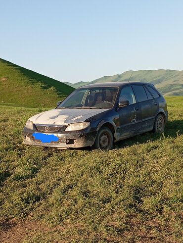 Mazda: Mazda 323: 2001 г., 1.6 л, Механика, Бензин, Минивэн