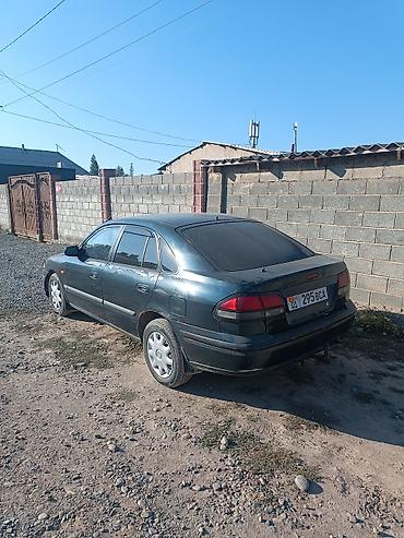 Mazda 626: 1999 г., 1.8 л, Механика, Газ