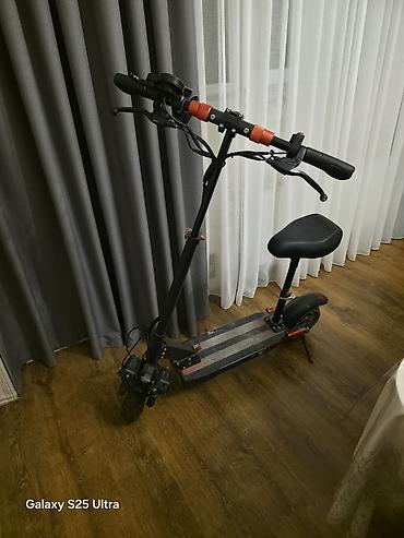 elektron velo: Elektrikli skuter – oturacaqlı, güclü və funksional şəhər modeli - — 2