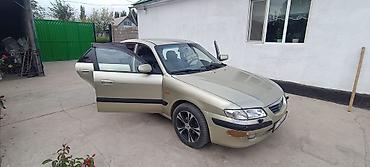 требуется тонар: Mazda Capella: 2000 г., 2 л, Автомат, Бензин, Седан — 3
