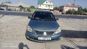 митсубиси мусо: Mitsubishi Lancer: 2006 г., 1.6 л, Механика, Бензин, Универсал — 6