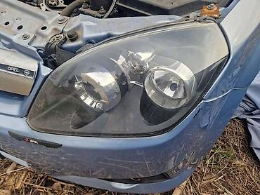 duboki branik golf 2: LEVI FAR CRNI ZA OPEL TIGRA | Svi delovi za Opel vozila : Astra G H — 1