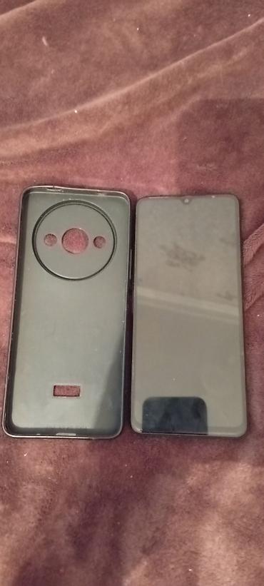 a3 kagiz: Redmi A3 smartfon - Model: Redmi A3 (şəkildə “About phone” bölməsində — 1