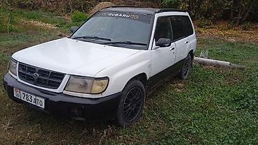музыка в авто: Subaru Forester: 1998 г., Универсал — 3