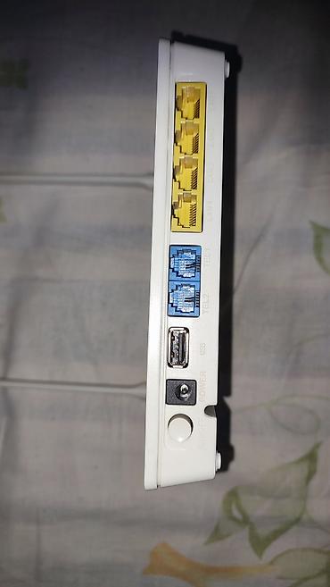 Modemlər və şəbəkə avadanlıqları: Huawei EchoLife HG6548M GPON ONU router - İki güclü Wi‑Fi anteni ilə — 2