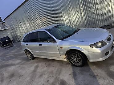 Mazda: Mazda 323: 2003 г., 1.3 л, Механика, Бензин, Универсал — 3