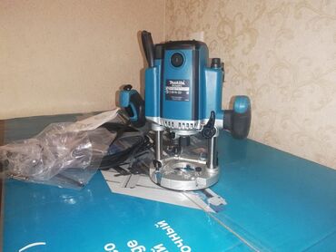 ручной гибочный инструмент: Boyuk əl frezi makita