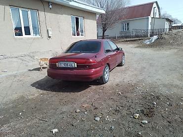 мото каракол: Ford : 1995 г., 2 л, Кол менен иштөөчү, Бензин, Седан — 5