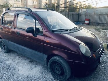 на матиз шины: Хэтчбек Daewoo Matiz, представленный в тёмно-бордовом цвете, является