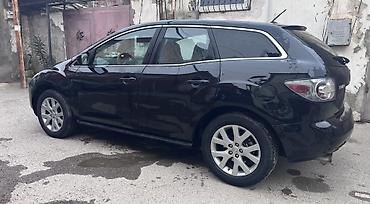 mazda 2: Mazda CX-7: 2.3 l | 2006 il Ofrouder/SUV — 5