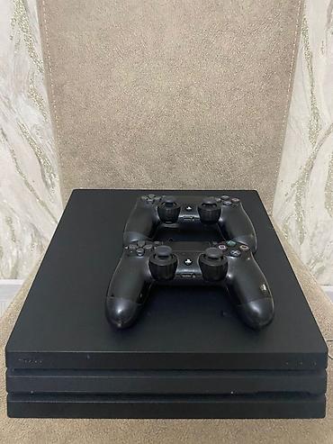 PS4 (Sony Playstation 4): Sony PlayStation 4 Pro oyun konsolu Xüsusiyyətlər: - Model: PS4 Pro — 1