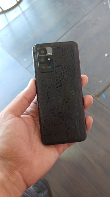 телефон fly ff249 black: Xiaomi Redmi 10, 64 ГБ, цвет - Черный, 
 Кнопочный, Отпечаток пальца, Две SIM карты
