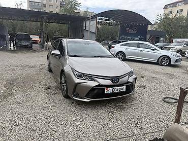 06: Toyota Corolla: 2020 г., 1.8 л, Гибрид, Седан — 4