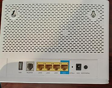 mifi router: Wi-Fi 6 - Gigabit VoIP Router - AX1800 Dual-Band Həm 5 Ghz (1200 — 3