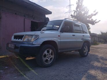 автомобили легкови: Mitsubishi Pajero: 1999 г., 1.8 л, Автомат, Бензин, Внедорожник