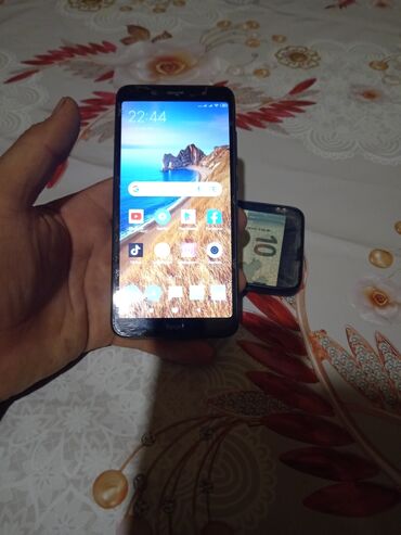 islenmis telefon: Xiaomi Redmi 7A, rəng - Qara