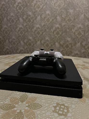 Video oyunlar və konsollar: PlayStation 4 Slim 500 gb oyun konsolu. Şəkillərdə göründüyü kimi — 4