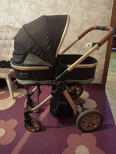 uşaq kolyaska: Çıxarıla bilən beşikli araba, Kidilo